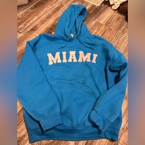 Blue Miami Hoodie, good condition, size medium